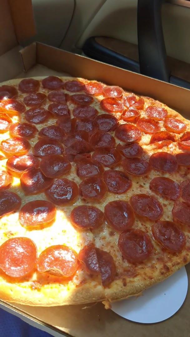 Geno's Pizza By The Slice